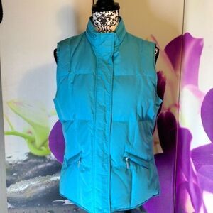 Talbots med aqua sleeveless vest with two front pockets, and a hidden hood.